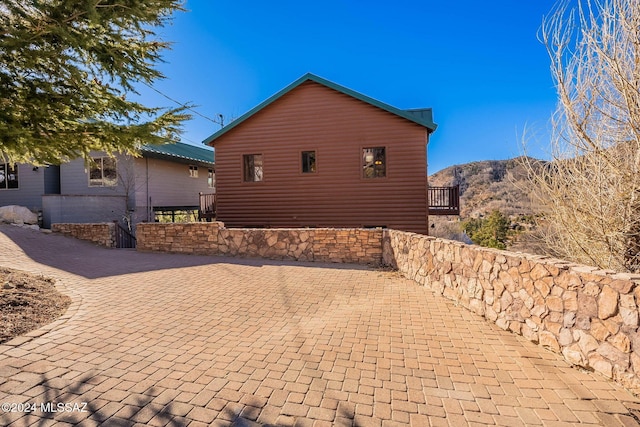 view of home's exterior featuring a mountain view