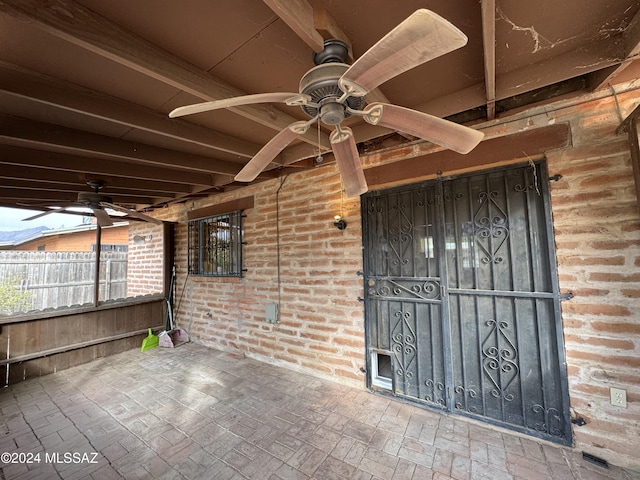 view of patio featuring ceiling fan