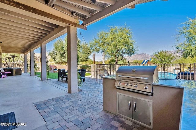 view of patio / terrace with a grill and exterior kitchen