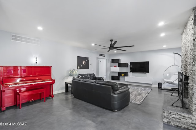 living room featuring ceiling fan