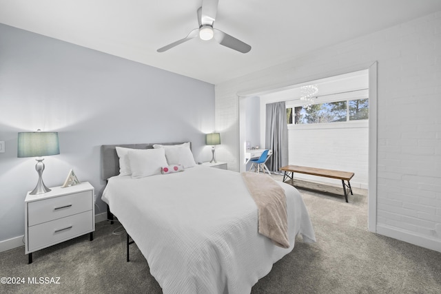 bedroom featuring ceiling fan and dark colored carpet