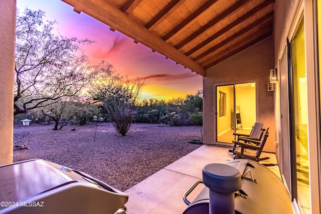 view of patio terrace at dusk