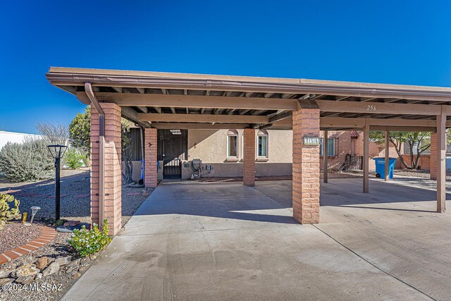 view of patio featuring a carport