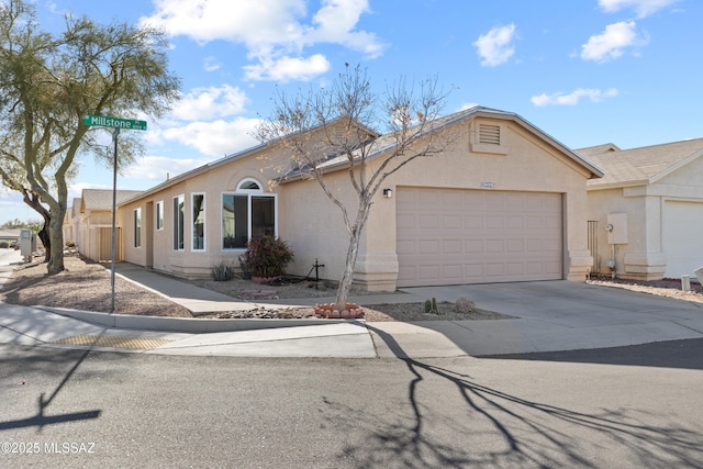 single story home with a garage