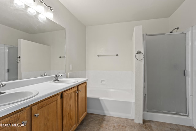 bathroom with vanity, tile patterned floors, and shower with separate bathtub