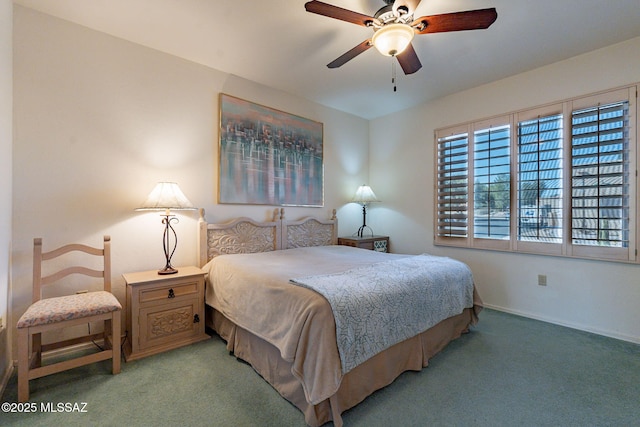 bedroom featuring ceiling fan and light carpet