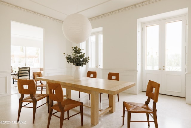 dining room featuring a wealth of natural light and french doors