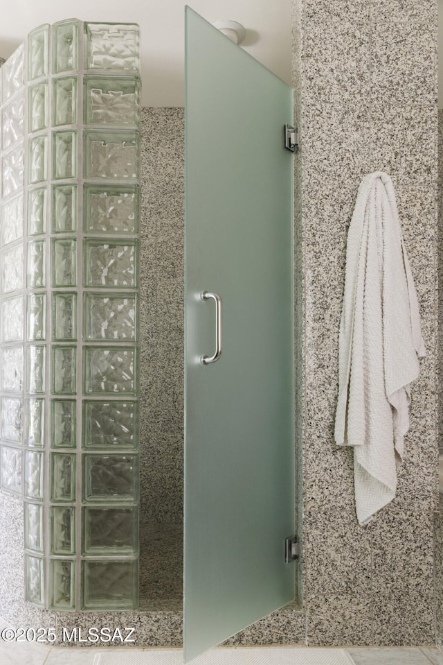 bathroom featuring walk in shower