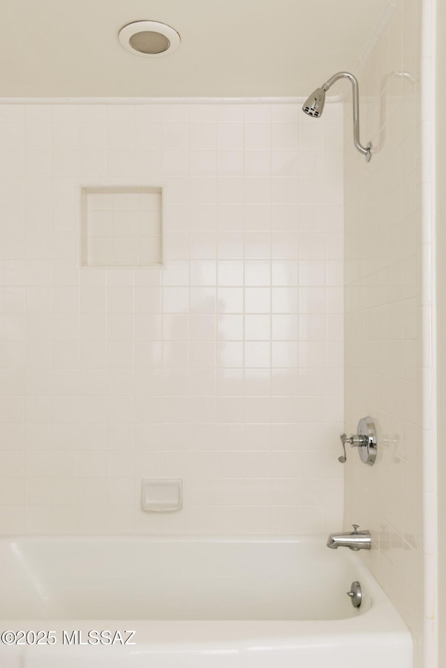 bathroom with shower / bathtub combination