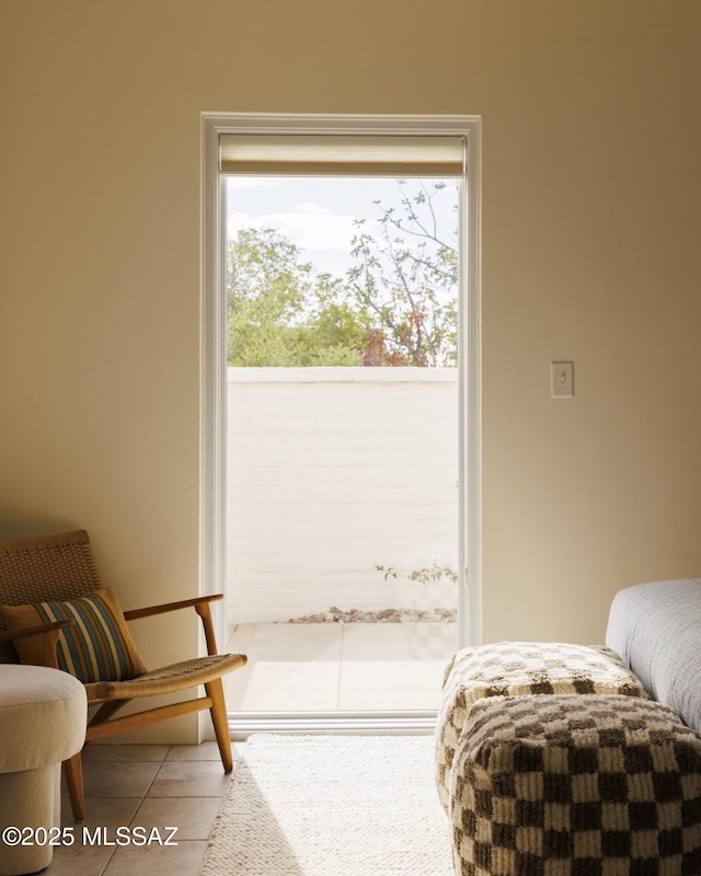 sitting room featuring light tile patterned floors