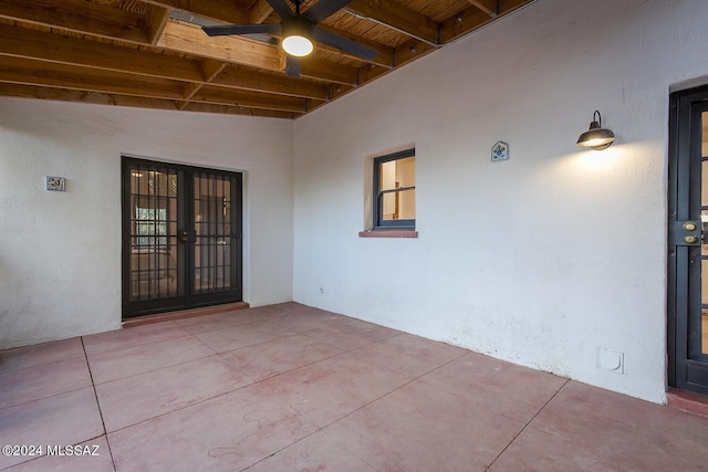 property entrance featuring french doors and a patio