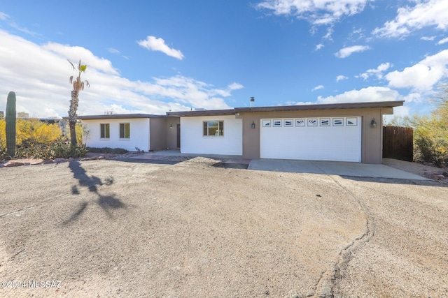 ranch-style house with a garage