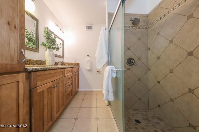 bathroom with vanity and an enclosed shower