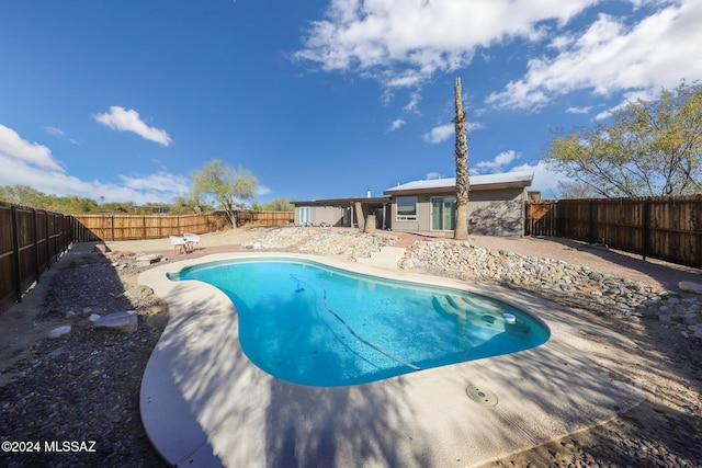 view of pool featuring a patio