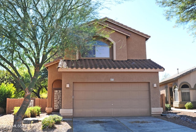 view of front of home with a garage