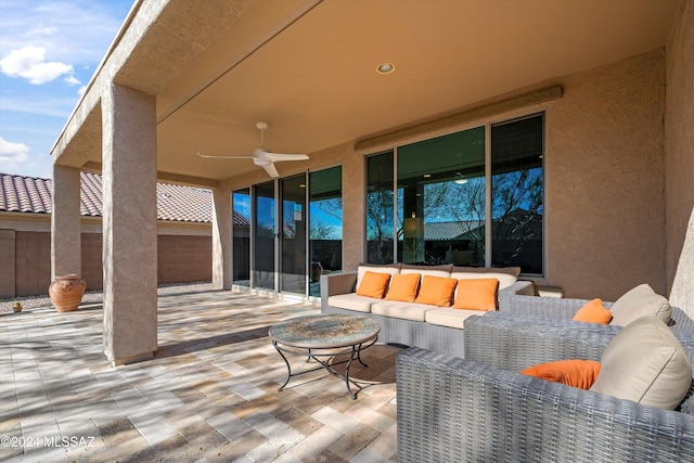 view of patio featuring ceiling fan and an outdoor hangout area