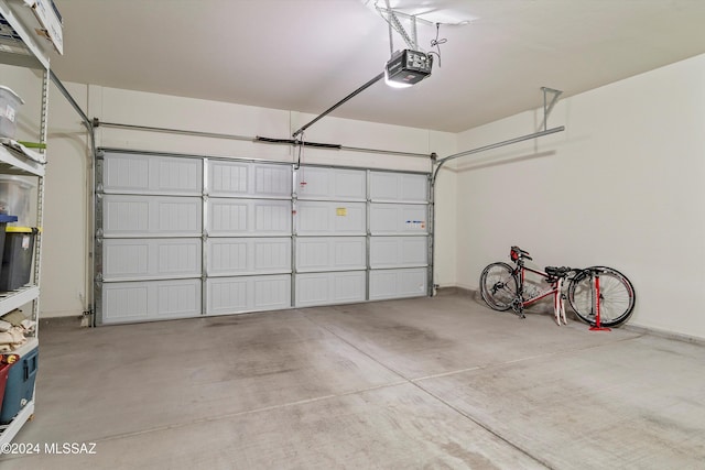 garage featuring a garage door opener
