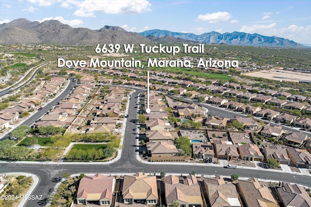 drone / aerial view featuring a mountain view