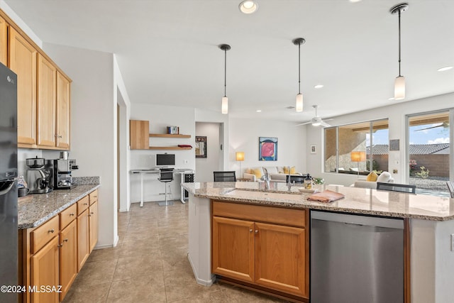 kitchen with dishwasher, light stone countertops, sink, and hanging light fixtures