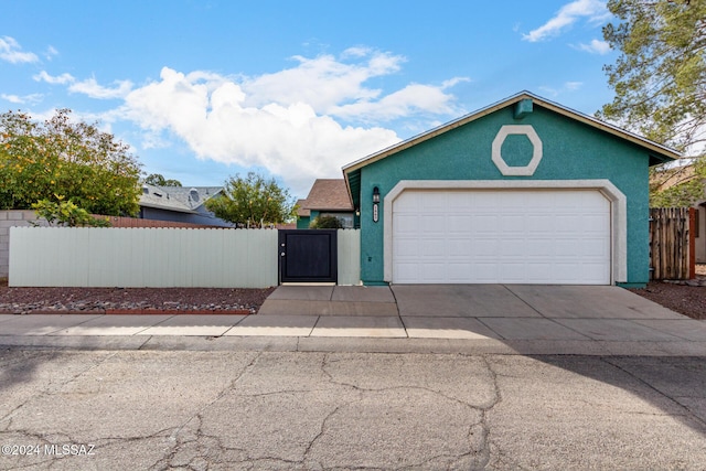 view of front of home featuring a garage