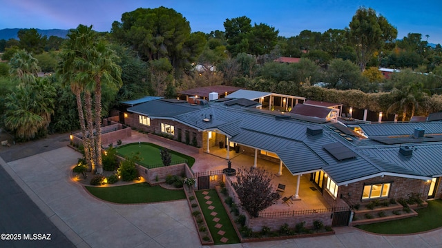 view of front of house with a patio area