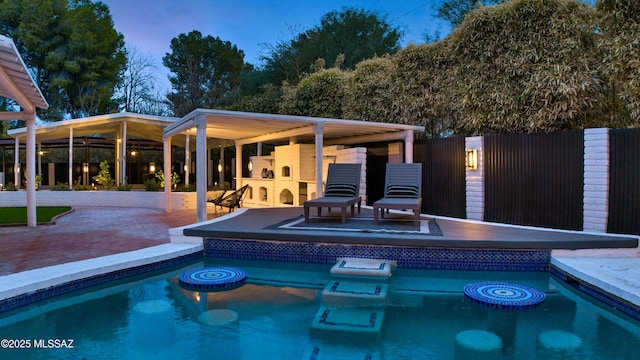 view of swimming pool featuring a patio