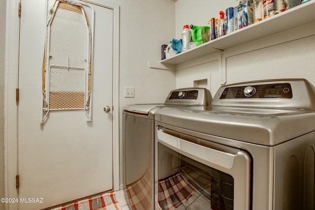 laundry room featuring separate washer and dryer