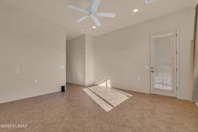 tiled empty room with ceiling fan