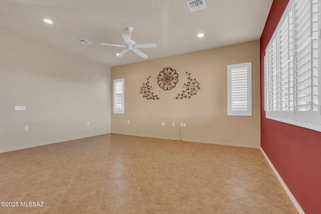 spare room with ceiling fan