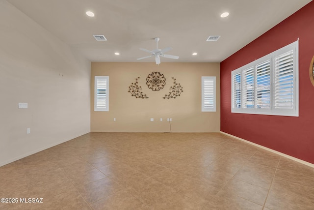 empty room featuring ceiling fan