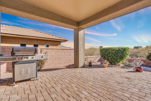 patio terrace at dusk with grilling area