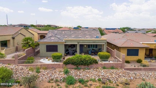 ranch-style house featuring a patio area