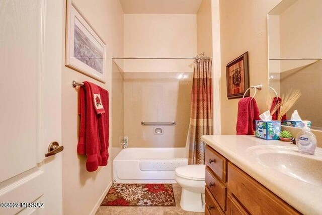 full bathroom with vanity, toilet, and shower / tub combo