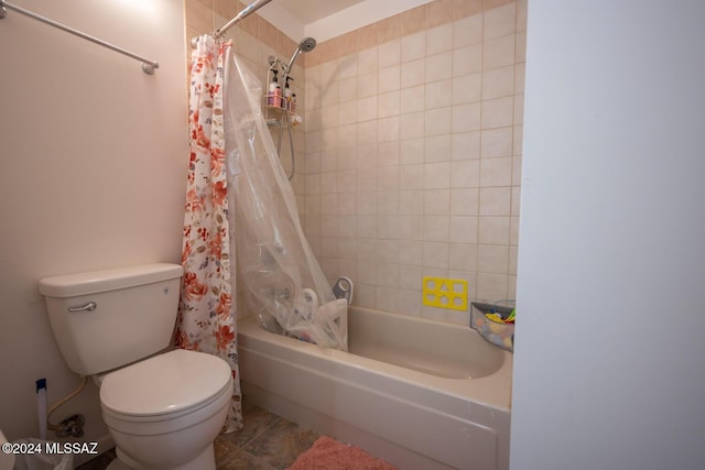 full bathroom with shower / tub combo with curtain and toilet