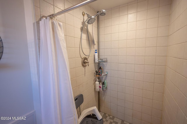 bathroom featuring a stall shower