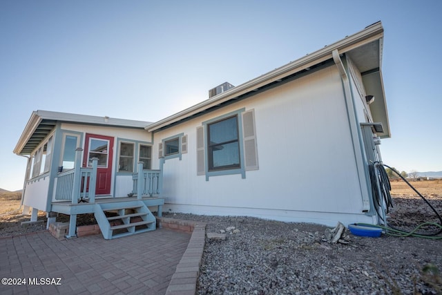 view of front of property featuring a patio