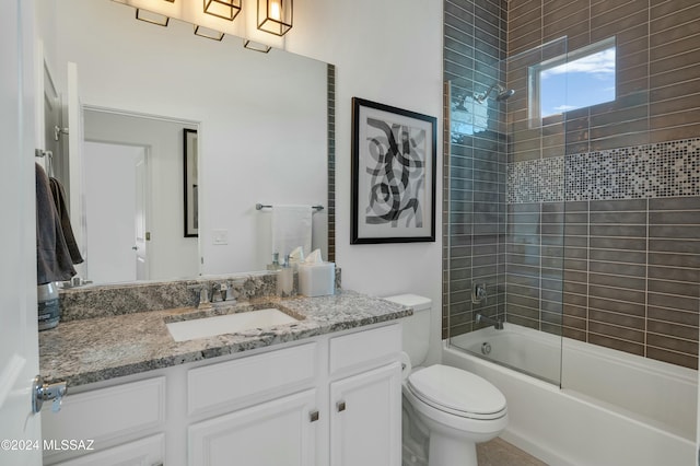 full bathroom featuring vanity, toilet, and bath / shower combo with glass door