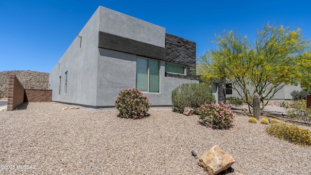 view of front of home featuring stucco siding