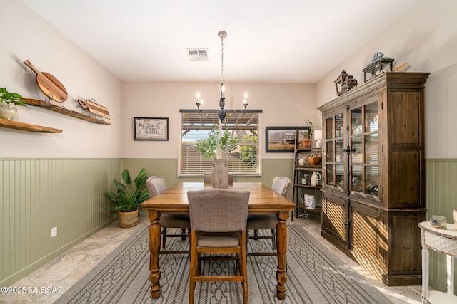 dining room with a chandelier