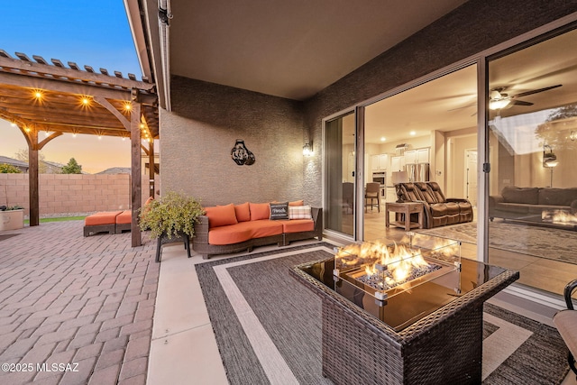 patio terrace at dusk with an outdoor living space