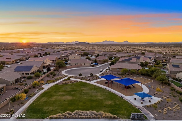 aerial view at dusk with a mountain view