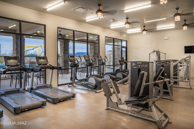 gym with ceiling fan