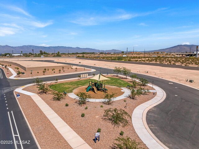 drone / aerial view featuring a mountain view