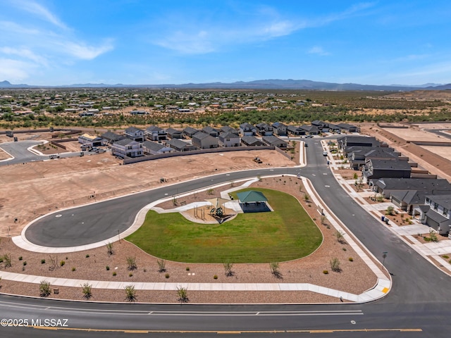 birds eye view of property featuring a mountain view