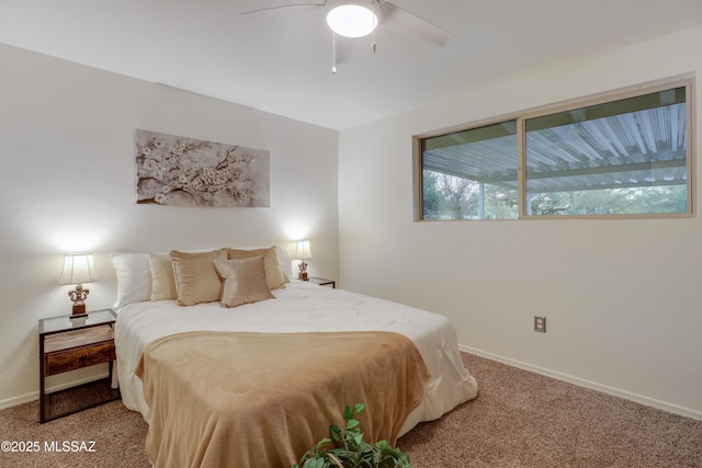 bedroom with ceiling fan and light colored carpet