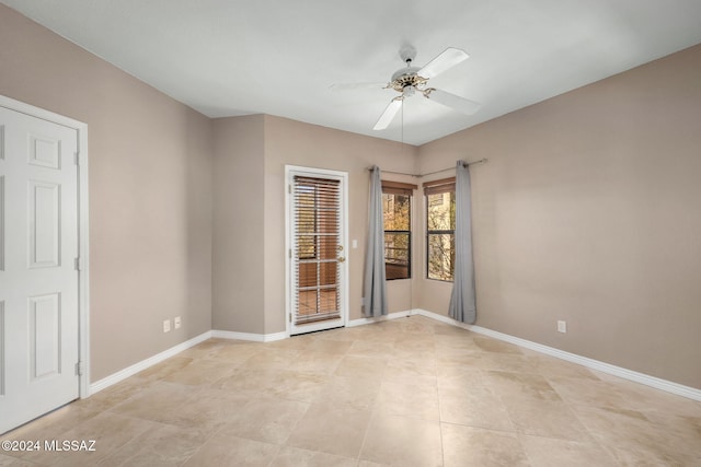 spare room featuring ceiling fan