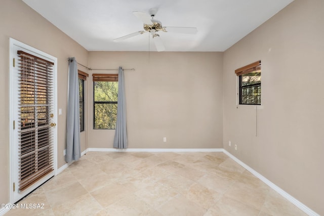 spare room featuring ceiling fan