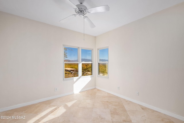 empty room with ceiling fan