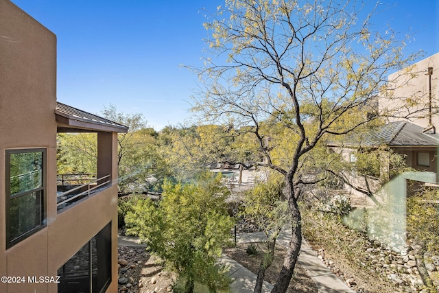 view of property exterior with a balcony