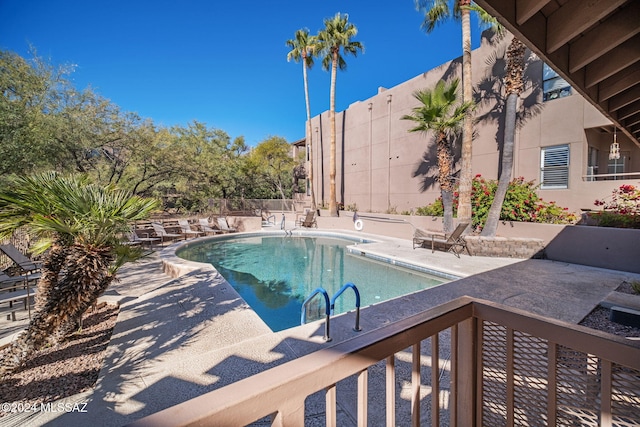 view of swimming pool featuring a patio